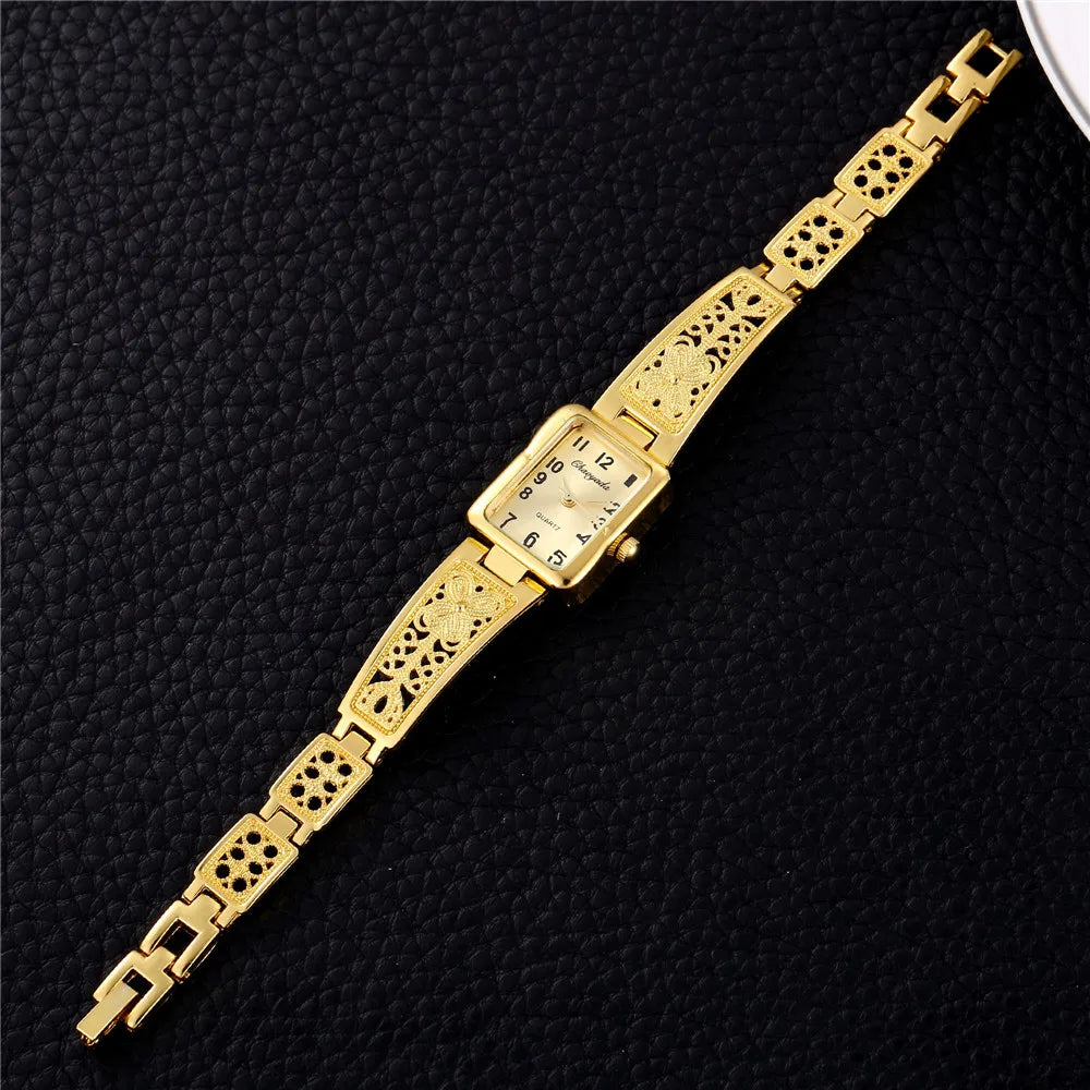 Montre Femme Quartz TINUORA TMC383 — Boîtier Rectangulaire Acier Inox, Chiffres Arabes, Style Luxe