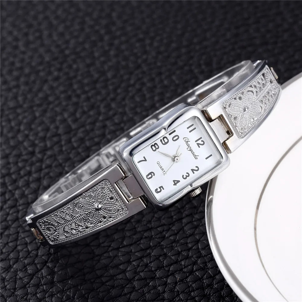 Montre Femme Quartz TINUORA TMC383 — Boîtier Rectangulaire Acier Inox, Chiffres Arabes, Style Luxe