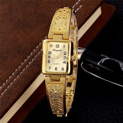 Montre Femme Quartz TINUORA TMC383 — Boîtier Rectangulaire Acier Inox, Chiffres Arabes, Style Luxe