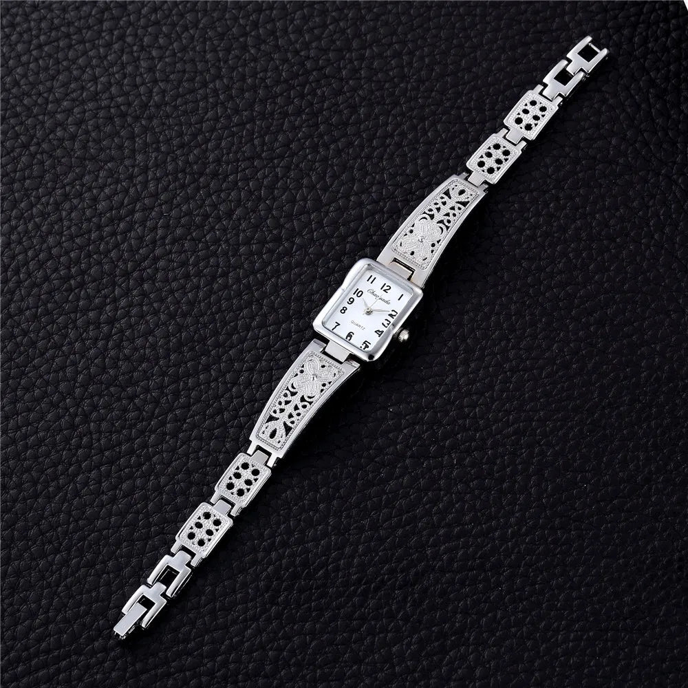 Montre Femme Quartz TINUORA TMC383 — Boîtier Rectangulaire Acier Inox, Chiffres Arabes, Style Luxe
