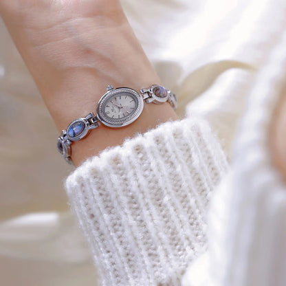 Montre Quartz Femme Bracelet Élégant — Boîtier Ovale 24 mm, Acier Inoxydable, Verre Hardlex, 3 ATM, 16 Coloris | TechNova X