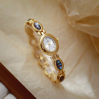 Femmes élégantes Bracelet montres conception Unique mode dames montres pour femme horloge Quartz montres haut de gamme de luxe