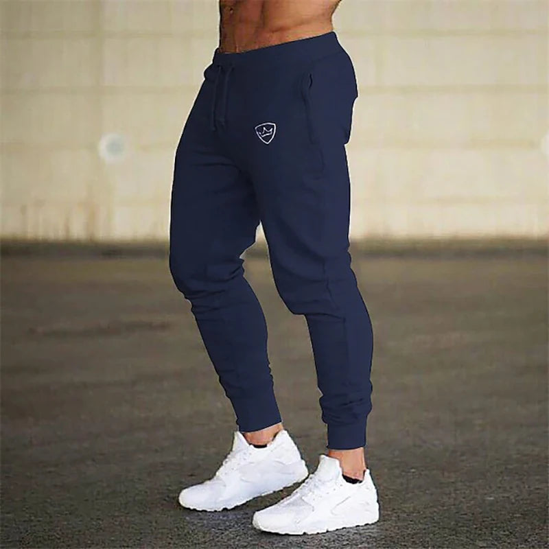 Bouclier imprimé nouveaux pantalons de survêtement pour hommes printemps automne respirant pantalons de Jogging plusieurs paquets mâle extérieur concis pantalon droit