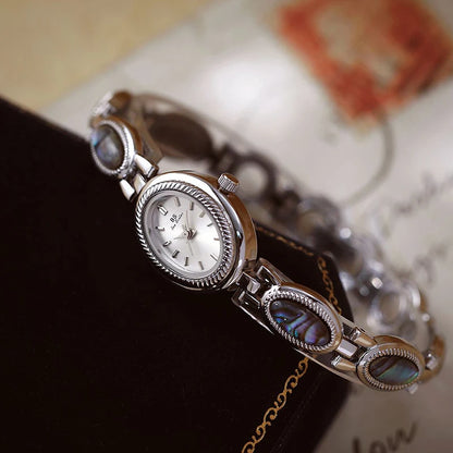Femmes élégantes Bracelet montres conception Unique mode dames montres pour femme horloge Quartz montres haut de gamme de luxe
