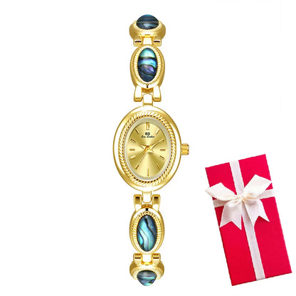 Femmes élégantes Bracelet montres conception Unique mode dames montres pour femme horloge Quartz montres haut de gamme de luxe