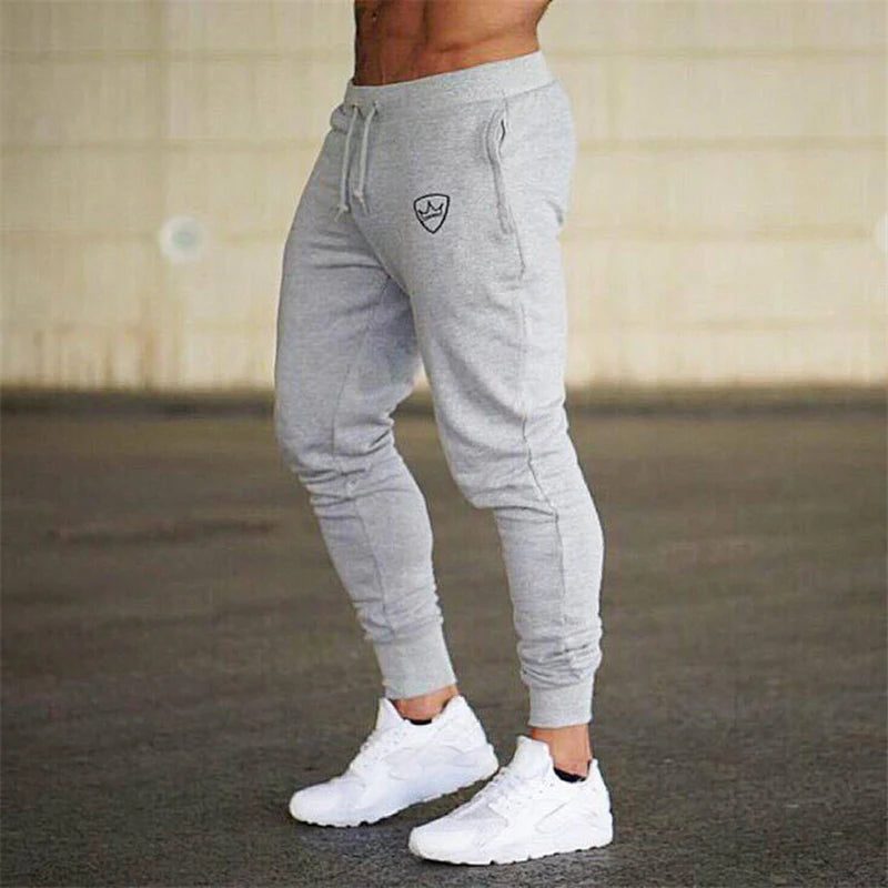 Bouclier imprimé nouveaux pantalons de survêtement pour hommes printemps automne respirant pantalons de Jogging plusieurs paquets mâle extérieur concis pantalon droit