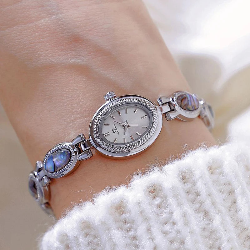 Femmes élégantes Bracelet montres conception Unique mode dames montres pour femme horloge Quartz montres haut de gamme de luxe
