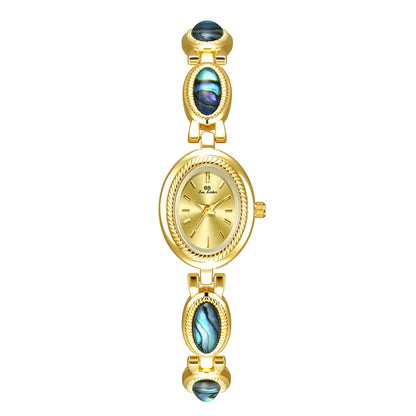 Femmes élégantes Bracelet montres conception Unique mode dames montres pour femme horloge Quartz montres haut de gamme de luxe