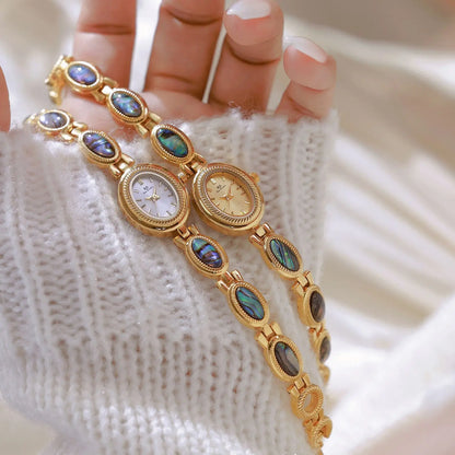 Femmes élégantes Bracelet montres conception Unique mode dames montres pour femme horloge Quartz montres haut de gamme de luxe
